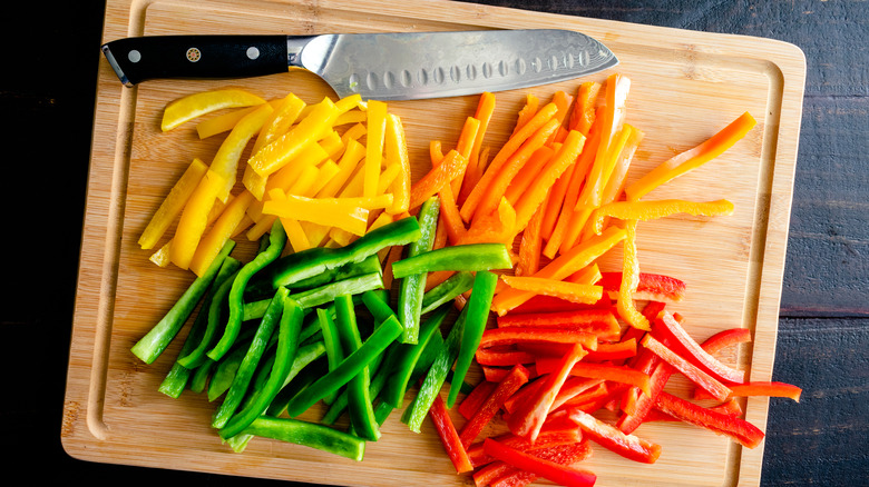 Cutting board with sliced bell peppers