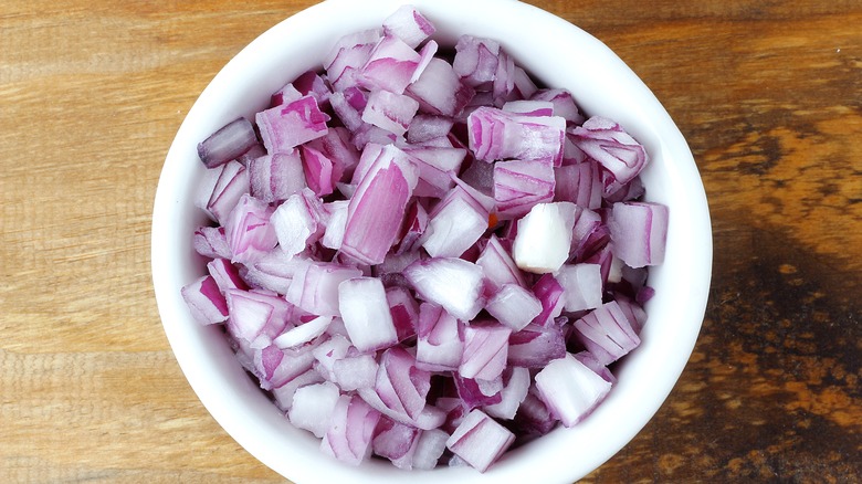 Bowl of diced red onions