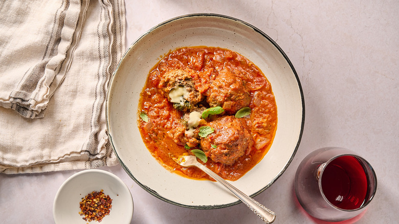 meatballs in arrabbiata sauce in bowl