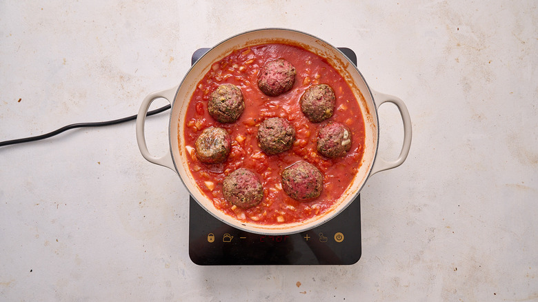 cooking meatballs in tomato sauce