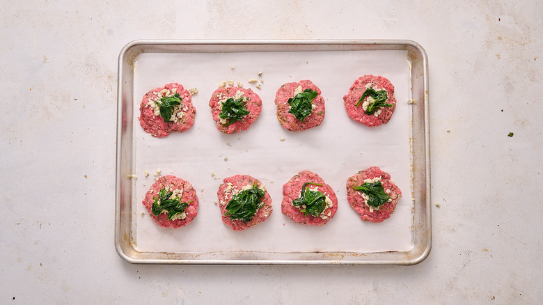 gorgonzola and spinach on meat disc