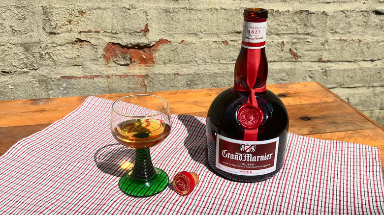 Grand Marnier bottle, glass