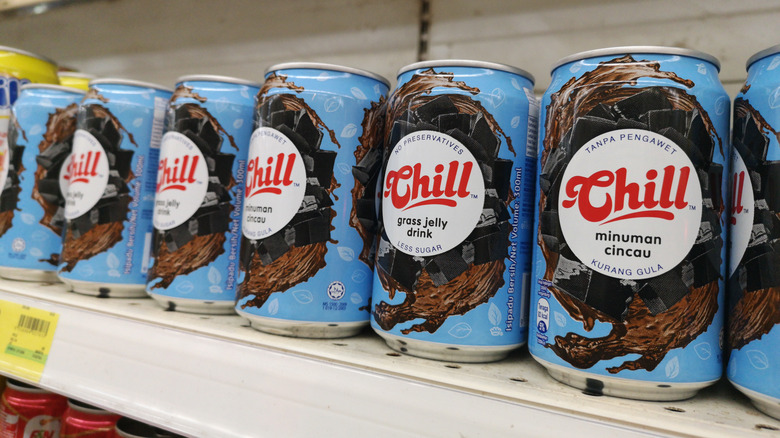 Cans of grass jelly on shelf