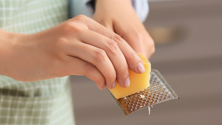 Grating Parmesan with microplane