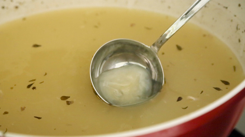 rice cooking in broth