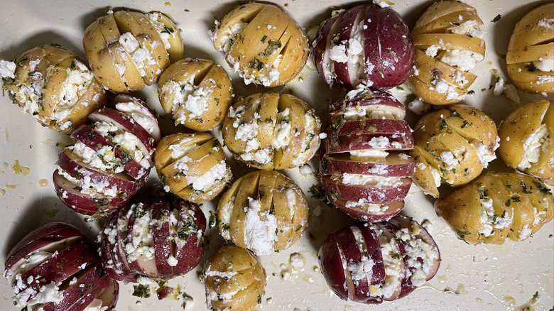 sliced potatoes with feta cheese