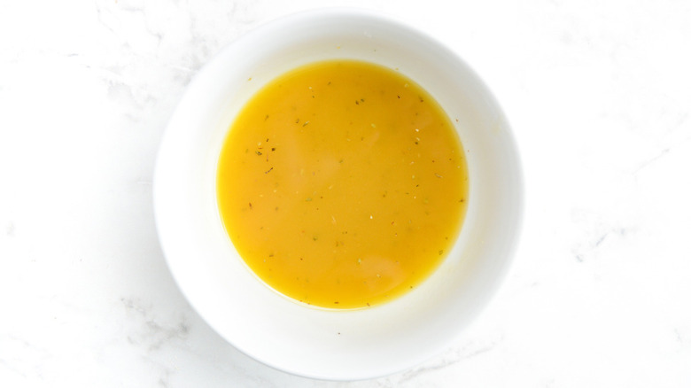 salad dressing in white bowl