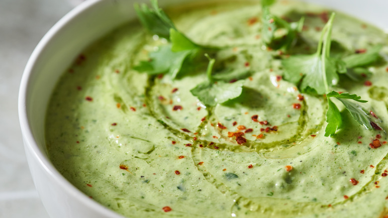 closeup green gazpacho in bowl