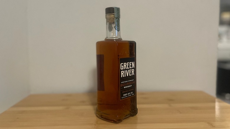 side view of Green River Bourbon Whiskey on table