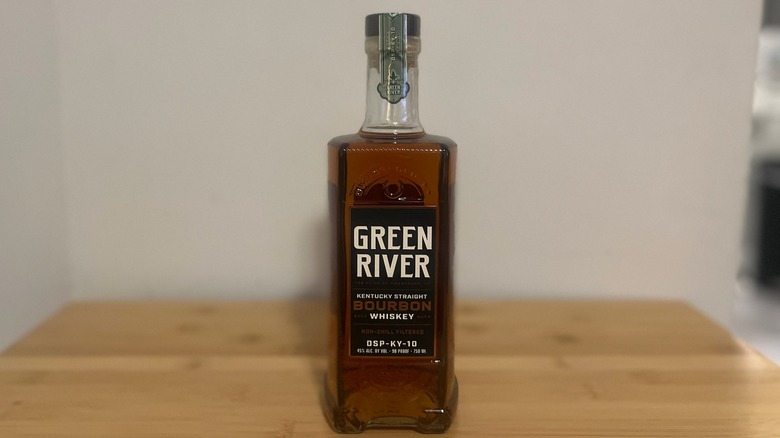 Green River Bourbon Whiskey bottle on table