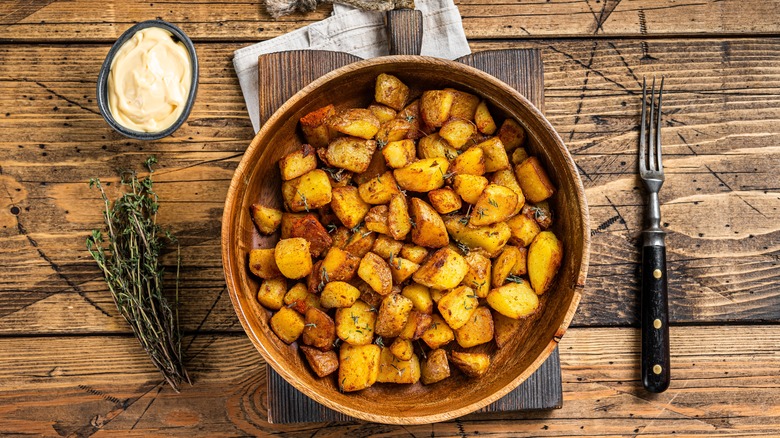 grilled potatoes on wood table