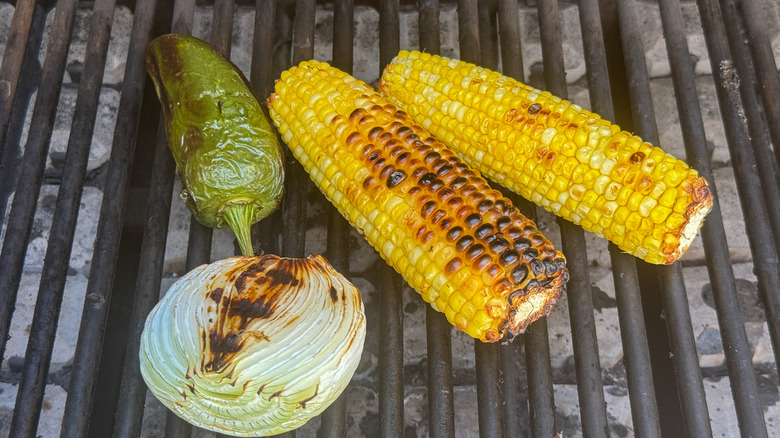 corn, jalapeno, and onion on grill