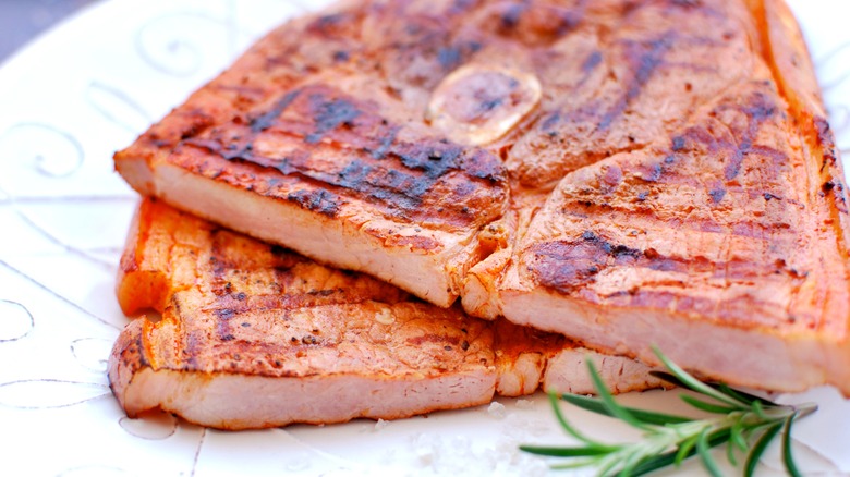 Grilled ham steaks on plate