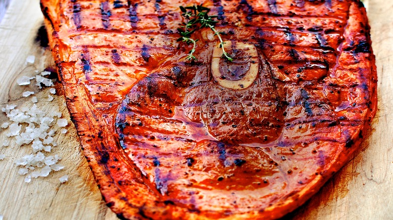 Ham steak on cutting board