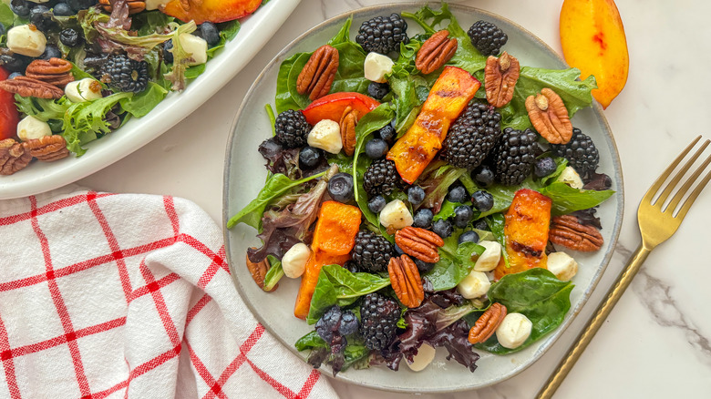 plate with nectarine salad and fork