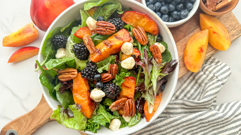 finished salad in white bowl