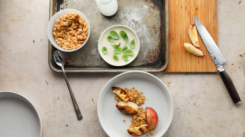 Nectarine and crumble on plate