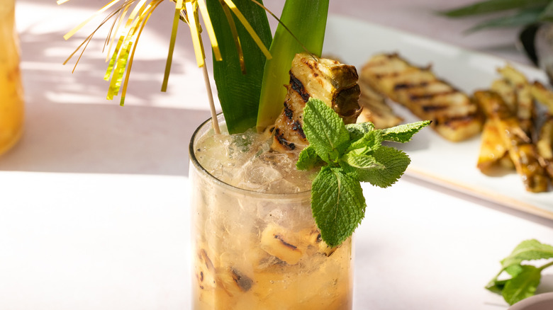 grilled pineapple mojito with garnishes