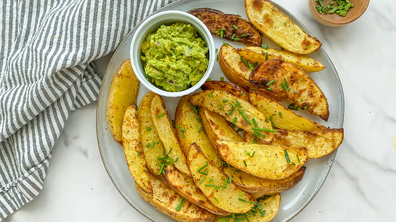 wedges on platter with guacamole