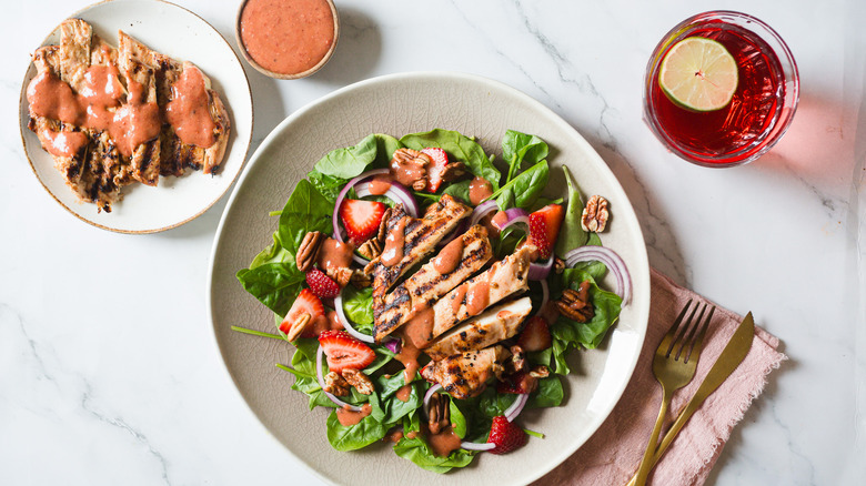 chicken strawberry salad on plate