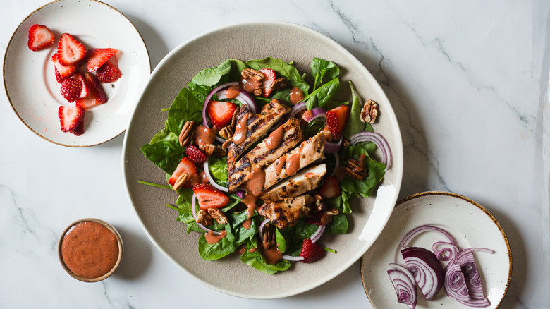 chicken strawberry salad on plate