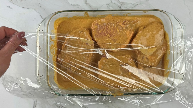 plastic wrapped pork chop dish