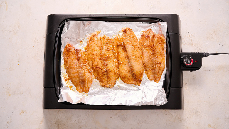 tilapia on a grill