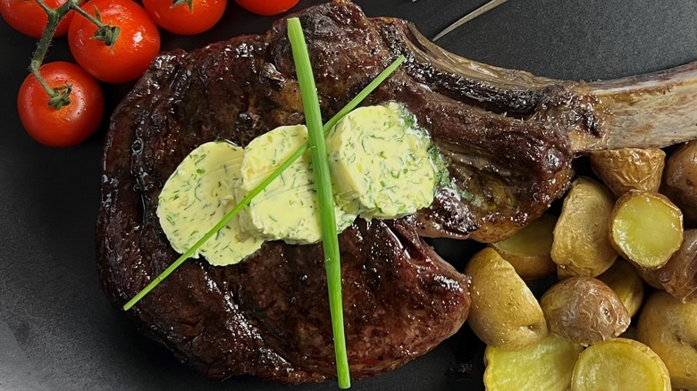 tomahawk steak with vegetables