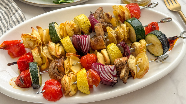 skewers on oval platter