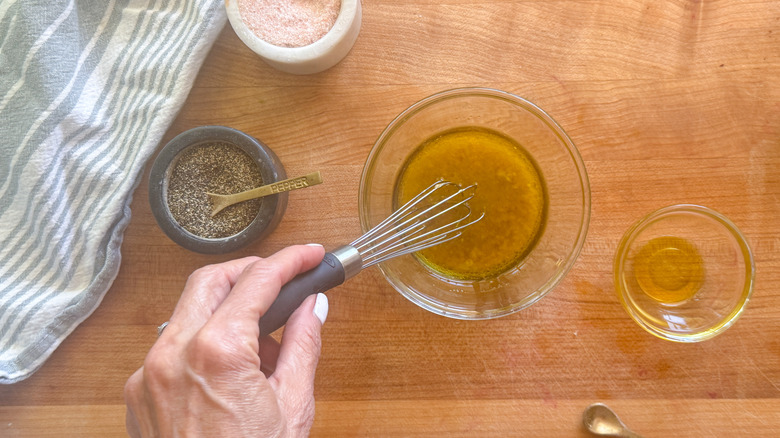 hand whisking vinaigrette