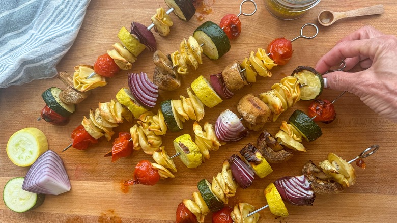 grilled skewers on board