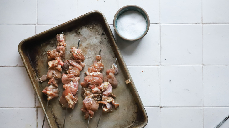 Chicken threaded on skewers