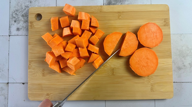 cubed sweet potato on board