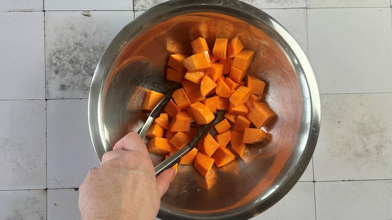 oiled sweet potatoes in bowl
