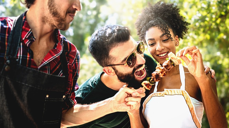 people enjoy shish-kebab