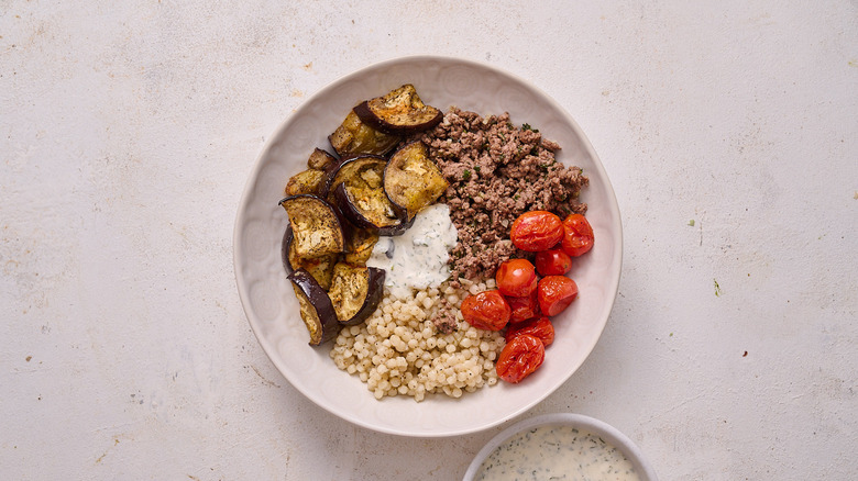 lamb grain bowl on table