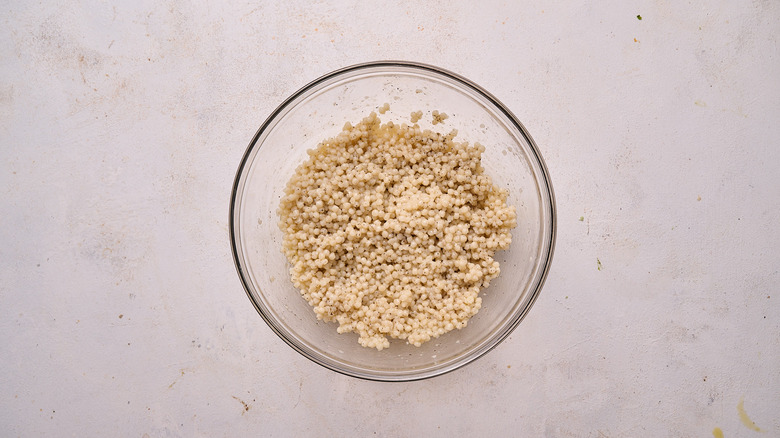 couscous in bowl with seasonings