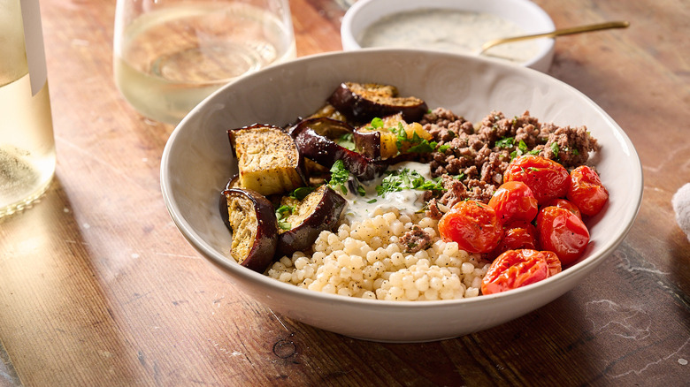 lamb grain bowl on table