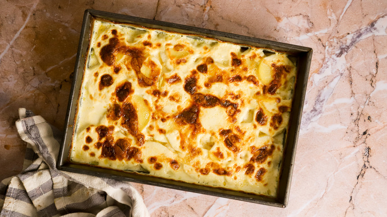 Pan of baked scalloped potatoes