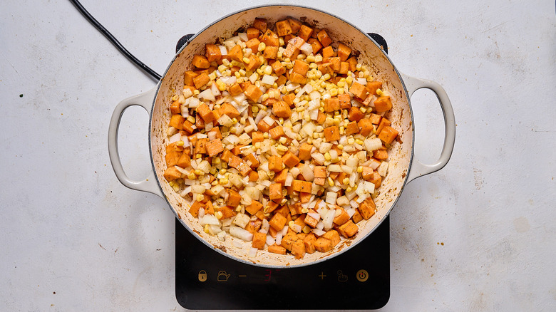 cooking veggies in skillet