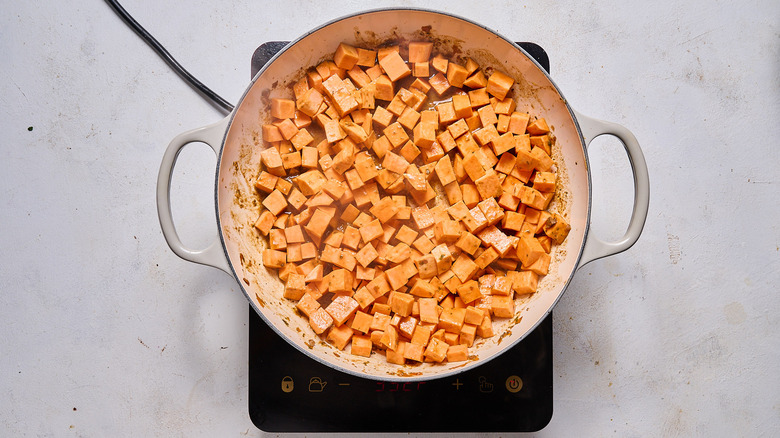 cooking potatoes in skillet 