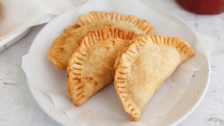 empanadas on white plate