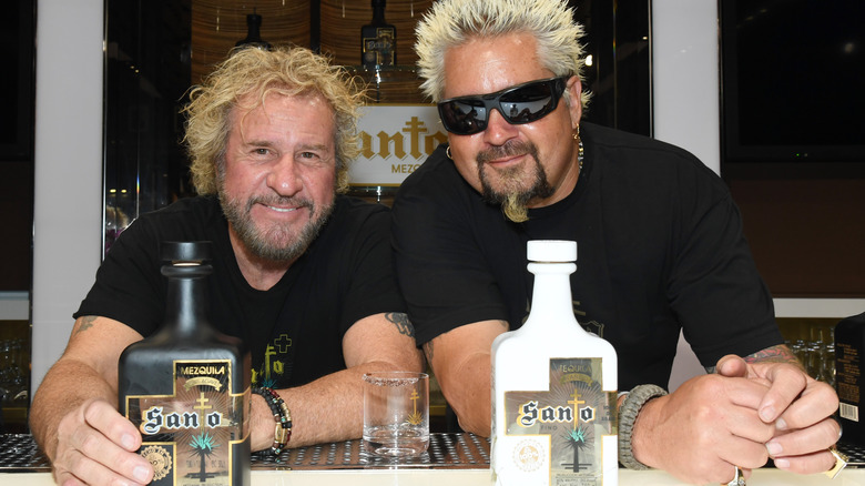 Guy Fieri and Sammy Hagar with tequila bottles