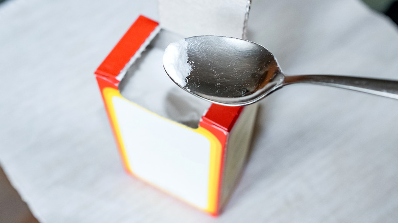 baking soda box and spoon