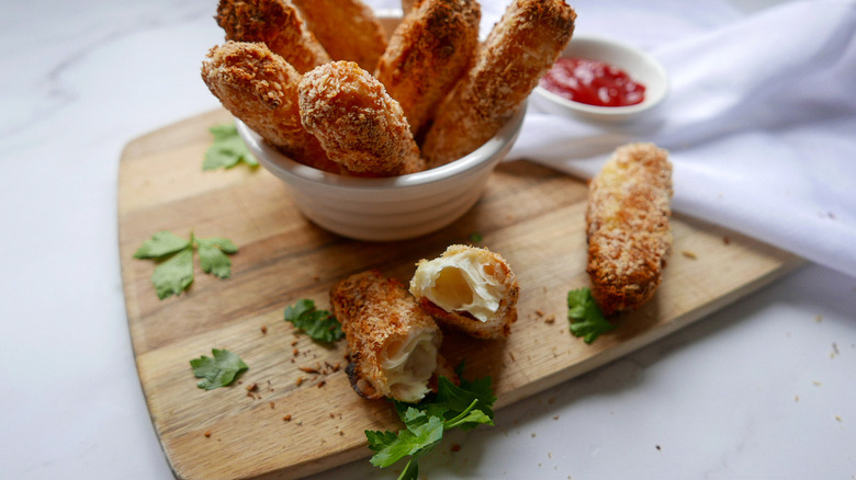 fried cheese sticks with ketchup