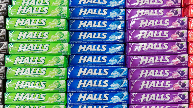 assorted packs of halls cough drops