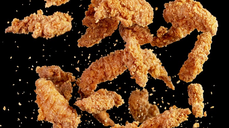 fried chicken black background