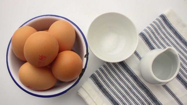 containers of eggs, salt, and vinegar