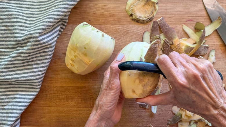 hand peeling rutabaga