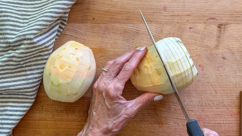 hand slicing rutabaga